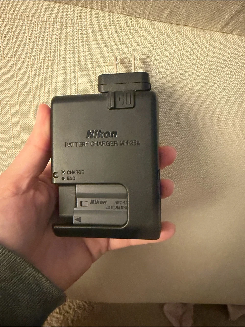 Nikon D7500 DSLR Camera with Black Lens and Red Strap